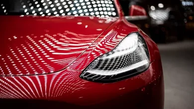 tesla-car-red-front-light-view-closeup